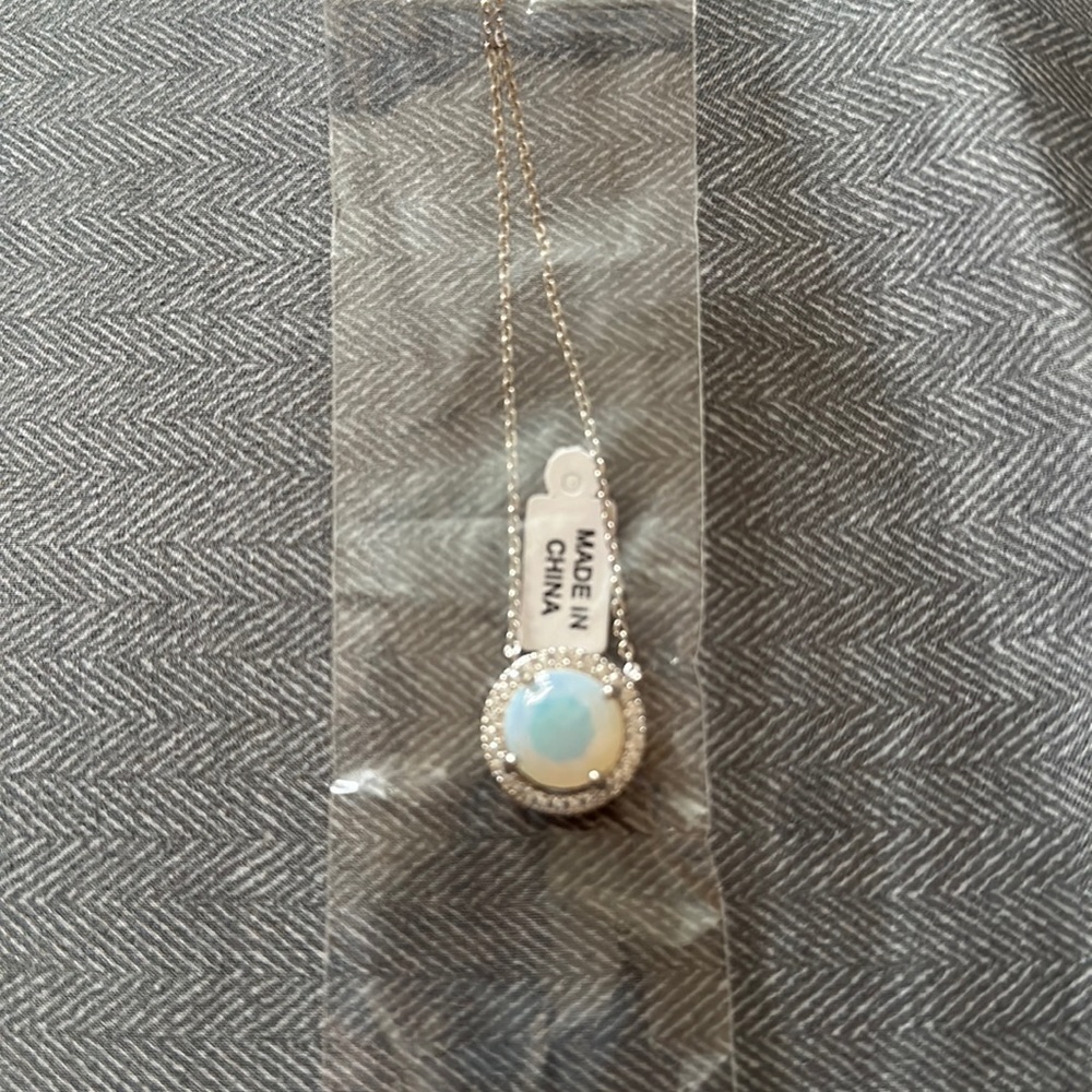 Opal style gem. New without tag